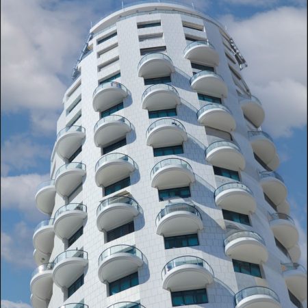 פרויקט חזית מאווררת פורצלן שחיל על בניין עם שלד עגול ״ישרוטל טאוור״ תל אביב. אספקה וביצוע – קבוצת רשף